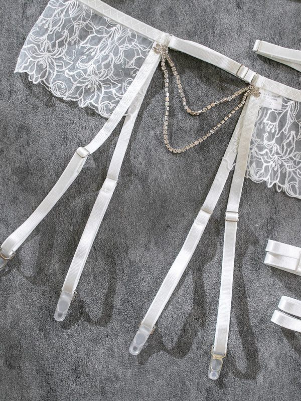 Women’s three-piece lace lingerie set with jewel detailing – elegant and glamorous